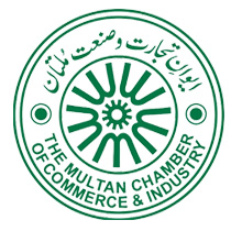 Vintage black-and-white photo of textile workers operating looms in a traditional weaving mill.