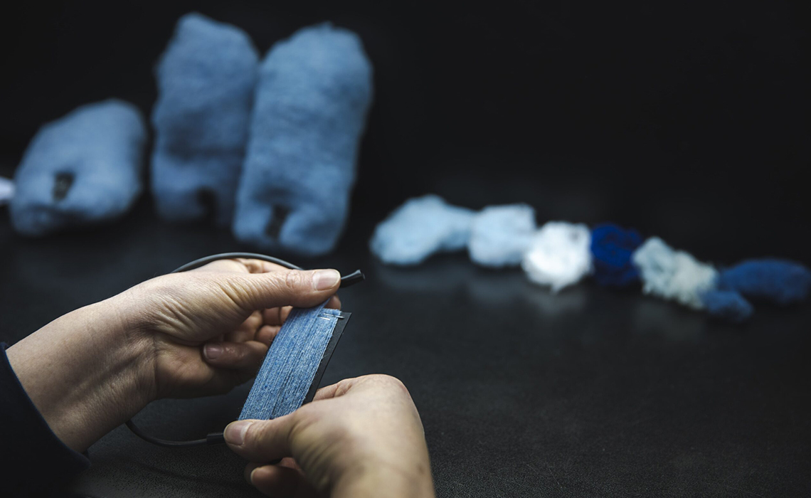 Yarn packaging labels with product details and traceable barcodes.