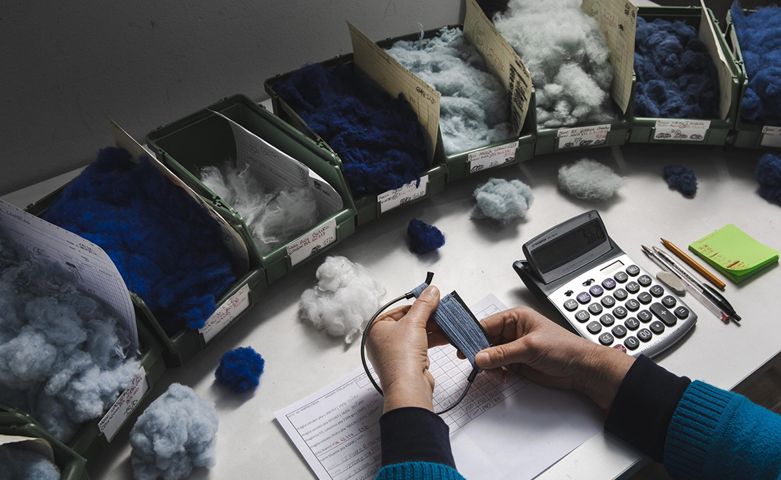 Yarn cones being securely packed for transport.