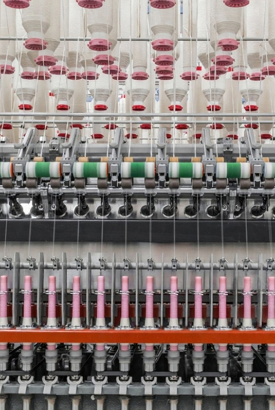 Modern ring spinning unit with rows of high-speed spinning frames