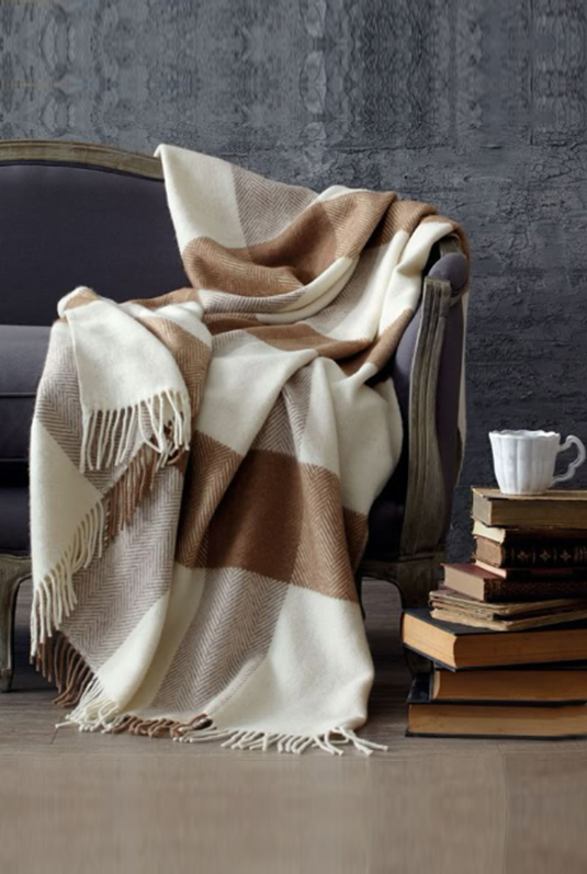 Luxurious woolen shawls with intricate texture and fine detailing